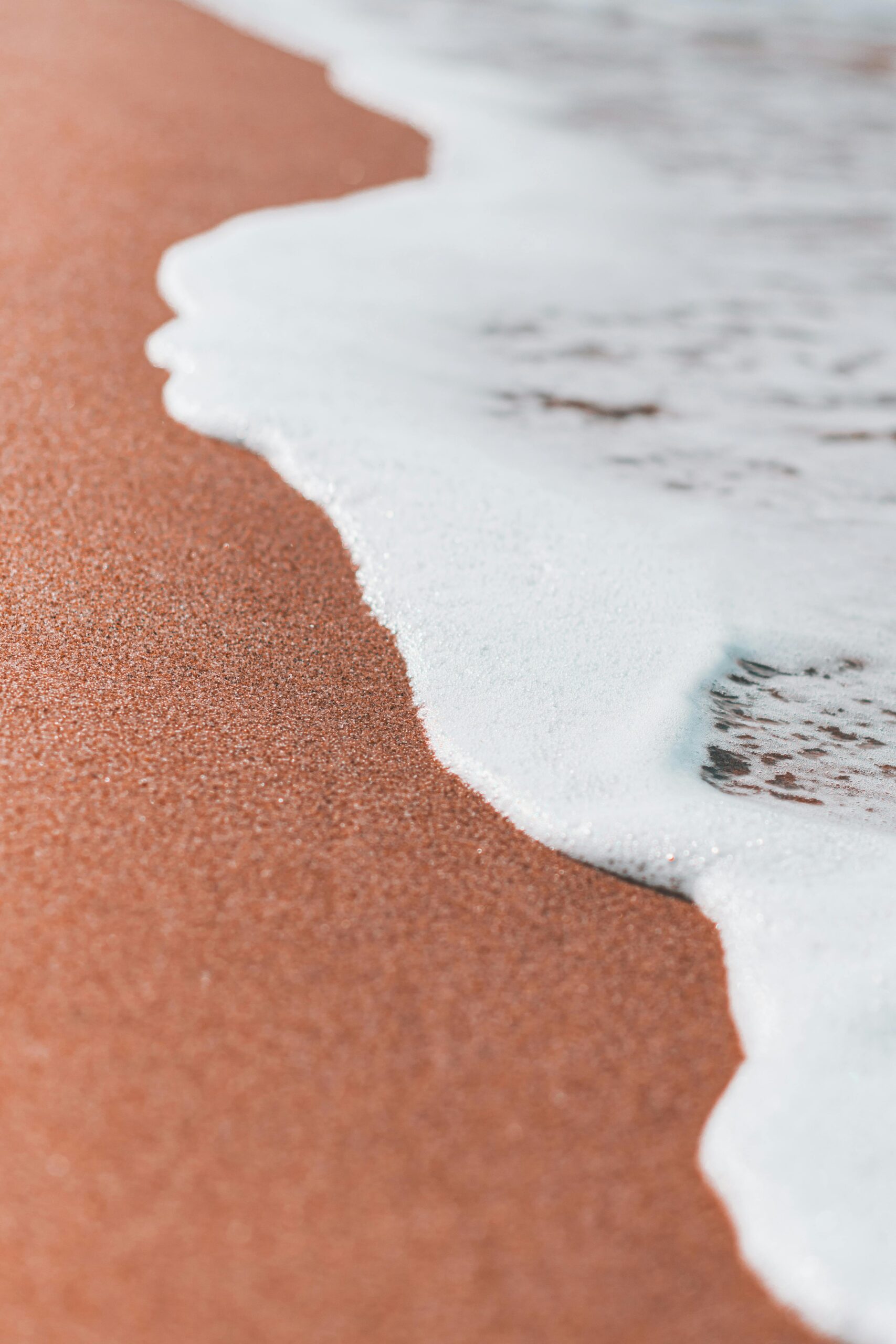 Peaceful beach scene with gentle waves on the Tabarka, Tunisia coast.